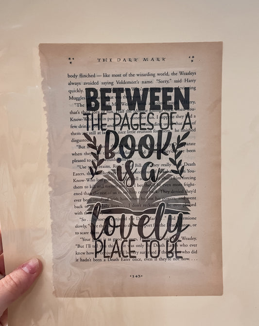 "Between the Pages of a Book is a Lovely Place to Be" Recycled Book Page Art Print